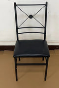 “Black metal dining table set with 4 chairs in modern kitchen”

“Compact 5-piece dining set with faux leather seats”

“Close-up of black chair with slatted back and cushioned seat”

“Space-saving dining table with wood grain finish”

“Modern 5-piece table and chair set for apartments”