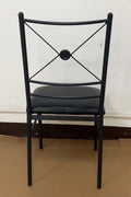 “Black metal dining table set with 4 chairs in modern kitchen”

“Compact 5-piece dining set with faux leather seats”

“Close-up of black chair with slatted back and cushioned seat”

“Space-saving dining table with wood grain finish”

“Modern 5-piece table and chair set for apartments”