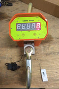 5 Ton Heavy-Duty Crane Scale with Digital Display – Yellow Model

10 Ton Crane Hanging Scale with LCD Display – Orange Model

Heavy-Duty Crane Scale with Remote Control in Use

Remote-Controlled Industrial Crane Scale – Front and Side View