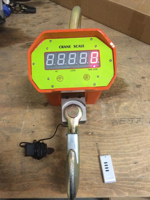 5 Ton Heavy-Duty Crane Scale with Digital Display – Yellow Model

10 Ton Crane Hanging Scale with LCD Display – Orange Model

Heavy-Duty Crane Scale with Remote Control in Use

Remote-Controlled Industrial Crane Scale – Front and Side View