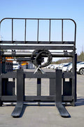 Side view of 5000 lb side shift pallet forks for skid steer

Heavy-duty hydraulic pallet fork with side shift mechanism

Pallet fork attachment mounted on forklift outdoors

Black steel frame skid steer pallet forks with side shift

Industrial pallet forks for warehouse and yard use