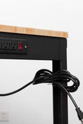 6 FT hardwood workbench with integrated power strip and steel legs

Adjustable black leg workbench with built-in power outlets

Compact 4 FT hardwood table with black metal frame

Workbench showing power outlet panel close-up

Side view of adjustable height workbench with solid wood top