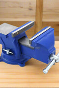 6-inch cast iron bench vise with swivel base – front angle
Heavy-duty workbench vise in blue – side view
Swivel base cast iron vise for mechanics and DIYers