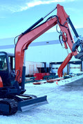 6 Ton Red Mini Excavator at Work in Snow – Side View

Compact Tracked Excavator – Hydraulic Boom in Operation

Mini Excavator Digging in Construction Zone – Model 1027621

Tracked Compact Excavator on Job Site – Red Machine Front View