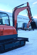 6 Ton Red Mini Excavator at Work in Snow – Side View

Compact Tracked Excavator – Hydraulic Boom in Operation

Mini Excavator Digging in Construction Zone – Model 1027621

Tracked Compact Excavator on Job Site – Red Machine Front View