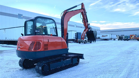 6 Ton Red Mini Excavator at Work in Snow – Side View

Compact Tracked Excavator – Hydraulic Boom in Operation

Mini Excavator Digging in Construction Zone – Model 1027621

Tracked Compact Excavator on Job Site – Red Machine Front View