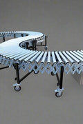 65 FT Expandable Electric Roller Conveyor with Powered Rollers

Close-up of roller segments and stainless steel frame

Adjustable legs with locking casters for stable movement

Extended conveyor system view – ideal for material handling

Compacted conveyor system showing portability and storage mode