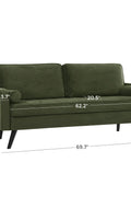 69.7-inch modern velvet sofa in navy blue with tufted back

Gray velvet upholstered sofa with pillows

Side view of modern green couch with wooden legs

Mid-century couch with tufted back and square arms