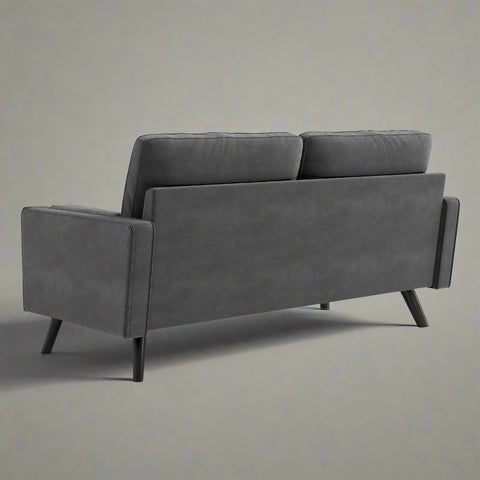 69.7-inch modern velvet sofa in navy blue with tufted back

Gray velvet upholstered sofa with pillows

Side view of modern green couch with wooden legs

Mid-century couch with tufted back and square arms