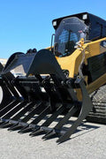 72" skid steer grapple bucket front view

84" rock grapple on skid steer in action

Close-up of dual hydraulic cylinder and hose setup

Heavy-duty tines and steel frame

Grapple holding large rocks and debris

