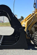 72" skid steer grapple bucket front view

84" rock grapple on skid steer in action

Close-up of dual hydraulic cylinder and hose setup

Heavy-duty tines and steel frame

Grapple holding large rocks and debris

