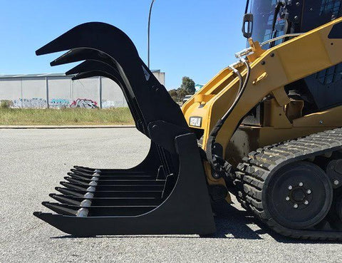 72" skid steer grapple bucket front view

84" rock grapple on skid steer in action

Close-up of dual hydraulic cylinder and hose setup

Heavy-duty tines and steel frame

Grapple holding large rocks and debris


