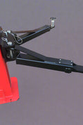 Red 2-post car hoist installed in garage

Close-up of safety lock and lift arms

Base of the lift showing manual release system

Top bar and symmetrical arm configuration