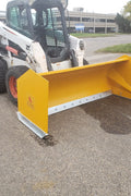 Bendall skid steer snow pusher attached to loader

Yellow snow box blade for skid steer

Heavy-duty snow bucket blade in winter setting

96-inch Bendall box blade in commercial snow use

Rear angle of Bendall snow blade showing mold board

