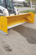 Bendall skid steer snow pusher attached to loader

Yellow snow box blade for skid steer

Heavy-duty snow bucket blade in winter setting

96-inch Bendall box blade in commercial snow use

Rear angle of Bendall snow blade showing mold board

