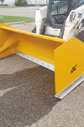 Bendall skid steer snow pusher attached to loader

Yellow snow box blade for skid steer

Heavy-duty snow bucket blade in winter setting

96-inch Bendall box blade in commercial snow use

Rear angle of Bendall snow blade showing mold board

