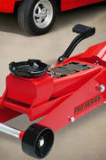 Big Red Steel Floor Jack – 2 Ton Hydraulic Lift Tool
Low Profile Red Garage Jack – Model T83502
Hydraulic Car Jack with Pedal and Casters
Heavy-Duty Vehicle Jack – Wide Base Support
Close-Up of Floor Jack Casters and Lifting Arm