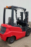 CanLift 5,500 lb electric forklift front side view

Side profile of electric forklift with red cabin

CanLift warehouse forklift with 4-foot lift

Battery-powered forklift in industrial setting

Forklift with cabin and side shift attachment