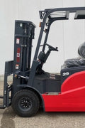 CanLift 5,500 lb electric forklift front side view

Side profile of electric forklift with red cabin

CanLift warehouse forklift with 4-foot lift

Battery-powered forklift in industrial setting

Forklift with cabin and side shift attachment