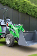 CanLift Lithium Electric Wheel Loader – Front View with Bucket
Green eco-friendly CanLift wheel loader on grass lot with trailer