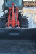 CanLift W12 Mini Wheel Loader with Kohler diesel engine outside a facility
Side view of CanLift W12 loader equipped with bucket attachment
Compact CanLift W12 Wheel Loader used on farm site
