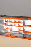 Clear drawer plastic tool box organizer with orange frame
Stackable parts storage bin for screws and fittings
Modular tool organizer with clear drawers and secure latch
Craft and DIY parts storage bin with removable dividers
Connectable plastic drawer organizer for hardware and beads