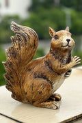 “Realistic squirrel statue for garden decor”

“Lawn ornament of wildlife squirrel in outdoor setting”

“Clever garden squirrel figurine sitting on grass”

“Outdoor backyard squirrel sculpture – brown and natural tone”

“Weatherproof squirrel statue for patio or lawn”


