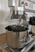 15 QT commercial dough mixer on stainless steel counter

Stainless steel mixing bowl with guard closed

Front view of food-grade commercial mixer with attachments

Dough hook installed on industrial kitchen mixer