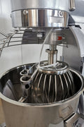 15 QT commercial dough mixer on stainless steel counter

Stainless steel mixing bowl with guard closed

Front view of food-grade commercial mixer with attachments

Dough hook installed on industrial kitchen mixer