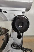 15 QT commercial dough mixer on stainless steel counter

Stainless steel mixing bowl with guard closed

Front view of food-grade commercial mixer with attachments

Dough hook installed on industrial kitchen mixer