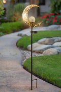 Crescent moon shaped solar LED light for garden pathway
Warm white crackle glass orb on solar-powered metal stand
Outdoor crescent moon decor light with solar panel
Elegant crackle glass garden light at night glowing warm white
Solar crescent garden light illuminating flower bed