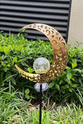 Crescent moon shaped solar LED light for garden pathway
Warm white crackle glass orb on solar-powered metal stand
Outdoor crescent moon decor light with solar panel
Elegant crackle glass garden light at night glowing warm white
Solar crescent garden light illuminating flower bed