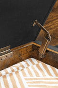 "Entryway storage bench ottoman with brown faux leather seat, metal frame, and hidden trunk storage"