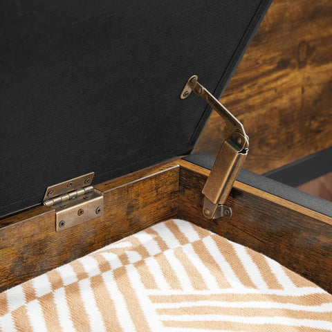 "Entryway storage bench ottoman with brown faux leather seat, metal frame, and hidden trunk storage"