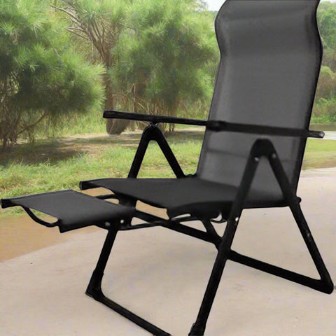 Outdoor ergonomic recliner chair – front angle view
Folding mesh camp chair in lounging position
Foldable chair with footrest deployed
Compact folded view of portable recliner