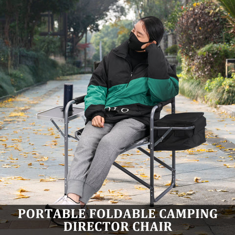 Heavy-duty folding camping chair with side table
Black outdoor director’s chair with cooler bag
Close-up of built-in cup holder and folding frame
Portable folding chair folded and packed for storage
Camping chair in use outdoors near a tent and a cooler