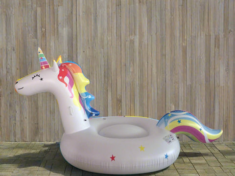 Giant inflatable unicorn pool float for two adults

White unicorn ride-on float with colorful mane and tail

Oversized raft-style unicorn pool float in living room

Heavy-duty vinyl unicorn float side view

114" unicorn float inflated and ready for the pool