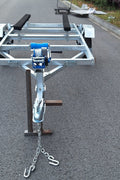 Heavy-duty galvanized 4x8 folding utility trailer with checker plate deck and road-ready tires