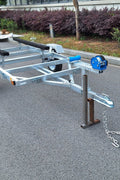 Heavy-duty galvanized 4x8 folding utility trailer with checker plate deck and road-ready tires