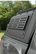 Side view of heavy-duty steel truck topper on black pickup
Modular canopy with open gullwing side door
Lockable utility cap rear view
Installation components of modular truck canopy
Steel topper installed on full-size pickup truck