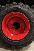 “Heavy duty skid steer tires with aggressive tread”

“SKS-1 and SKS-4 tires for Bobcat A300 and S750”

“Skid steer tires with red and silver rims”

“10x16.5 to 15x19.5 skid steer tire variants”

“Close-up of durable construction skid steer tire”

