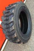 “Heavy duty skid steer tires with aggressive tread”

“SKS-1 and SKS-4 tires for Bobcat A300 and S750”

“Skid steer tires with red and silver rims”

“10x16.5 to 15x19.5 skid steer tire variants”

“Close-up of durable construction skid steer tire”

