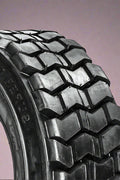 “Heavy duty skid steer tires with aggressive tread”

“SKS-1 and SKS-4 tires for Bobcat A300 and S750”

“Skid steer tires with red and silver rims”

“10x16.5 to 15x19.5 skid steer tire variants”

“Close-up of durable construction skid steer tire”

