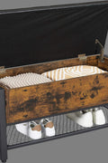 "Industrial storage bench with black metal frame, tufted seat, open shelf, and trunk compartment – Model LSB47BX"