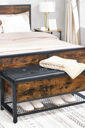 "Industrial storage bench with black metal frame, tufted seat, open shelf, and trunk compartment – Model LSB47BX"