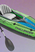 Intex Challenger K1 inflatable kayak on water

1-person green inflatable kayak set with oar and pump

Inflatable kayak with seat and cargo net

Kayak set components: paddle, pump, skeg, repair patch

Recreational lake kayak for solo paddlers