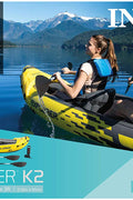 Intex Explorer K2 inflatable kayak on water with paddles

Top view of Explorer K2 kayak with seats and pump

Close-up of inflatable cockpit seats

Full kayak set with oars, pump, and skeg

Explorer K2 in yellow – packaged with accessories