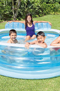 Intex Swim Center Family Lounge Pool with kids

Top view of inflatable lounge pool with bench

Inflatable family pool with built-in seat and backrest

Parents and kids relaxing in backyard pool

Blue vinyl family-size lounge pool filled with water