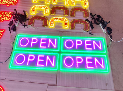 “Jumbo neon LED open sign hanging in storefront window”

“Close-up of waterproof bright open sign for business”

“High visibility LED open sign with pink and green lighting”