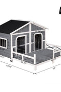 Large wooden raised outdoor dog house with porch – cabin-style weatherproof pet shelter
